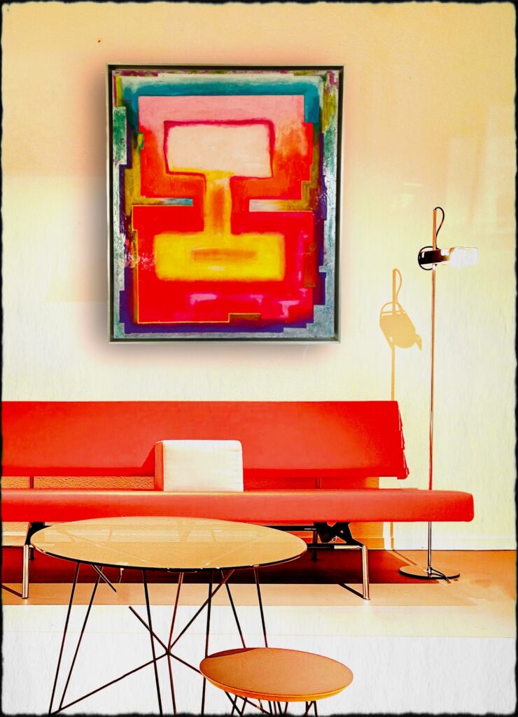Abstract schilderij met felle neon kleuren in rood en geel met blauw in setting met rode bank